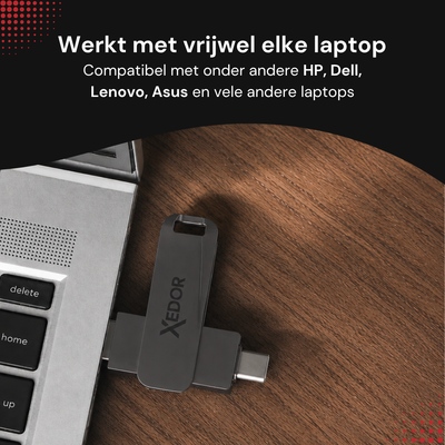 Donkergrijze Xedor Base USB-stick in een laptop: werkt met onder andere HP, Dell, Lenovo en Asus